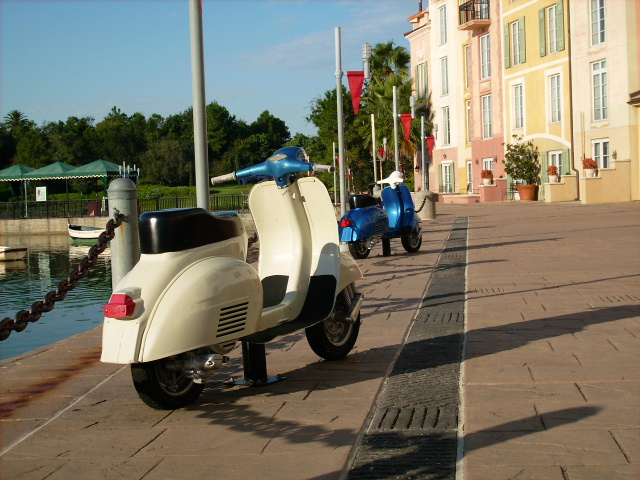 scooter parked alongside the water at Loews Portofino Bay Hotel Universal Orlando Resort. Keep reading to find out more about HHN hotels.