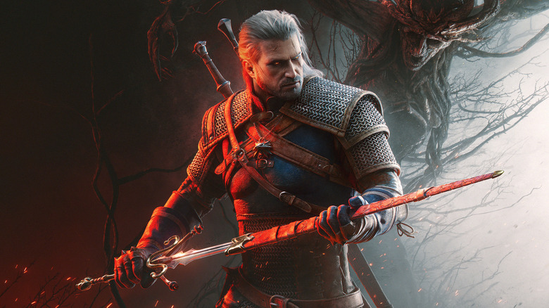 Geralt of Rivia unsheathes his sword in promotional artwork for The Witcher 3: Wild Hunt