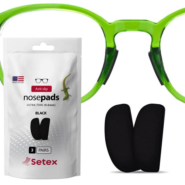 Packaging and pair of black anti-slip ultra-thin nose pads for glasses by Setex, shown next to large eyeglasses frame