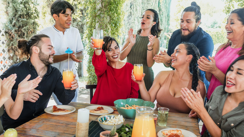 A large family enjoying a meal in Mexico.