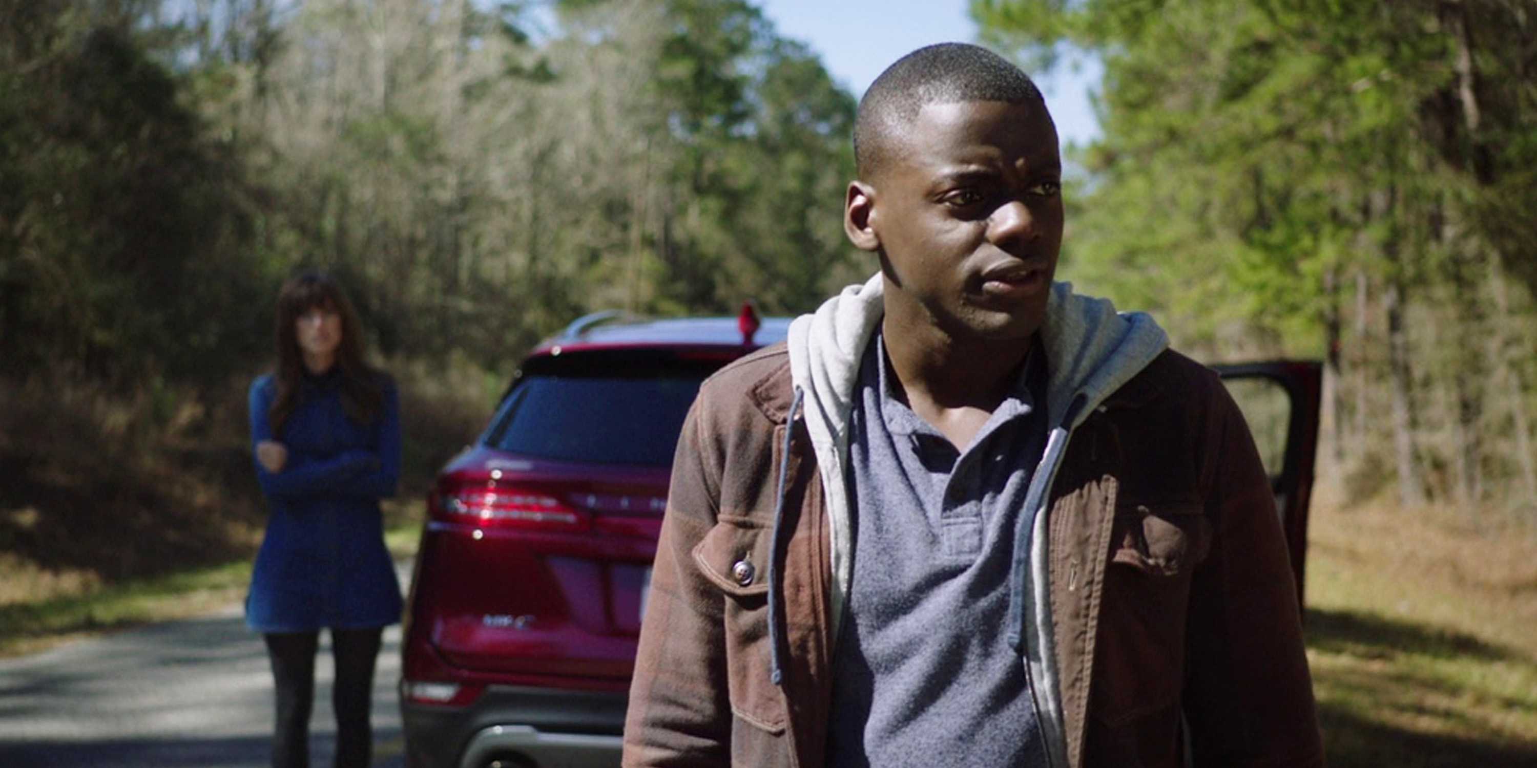 Daniel Kaluuya and Allison Williams with their car in Get Out