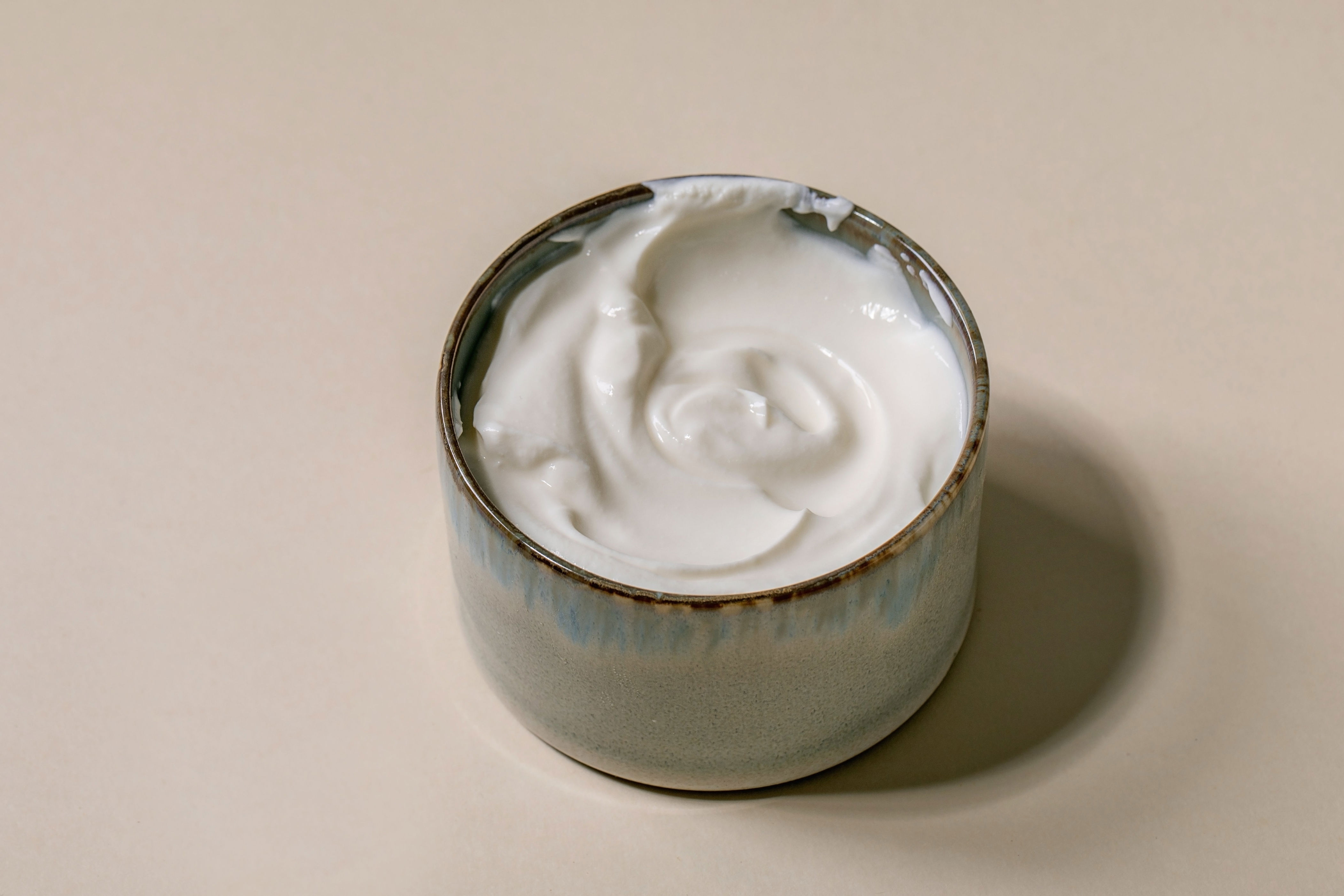 A bowl filled with sour cream