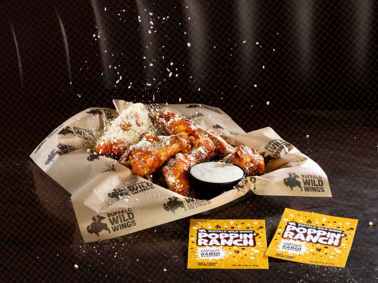 Basket of Buffalo Wild Wings chicken wings with Poppin' Ranch packets