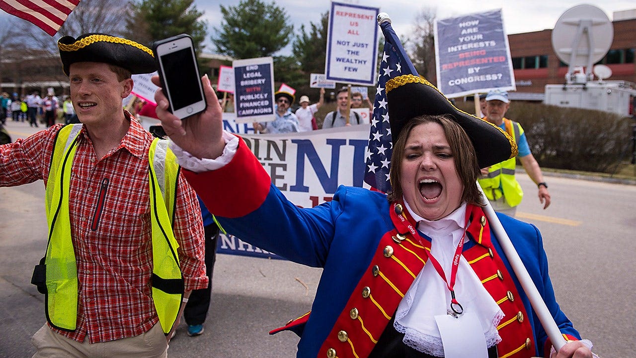 New Hampshire state Rep. Ellen Read, pictured during a political demonstration in 2015, is seeking to dismiss two speeding cases by arguing the state constitution protected her from arrest while traveling to or from legislative session.