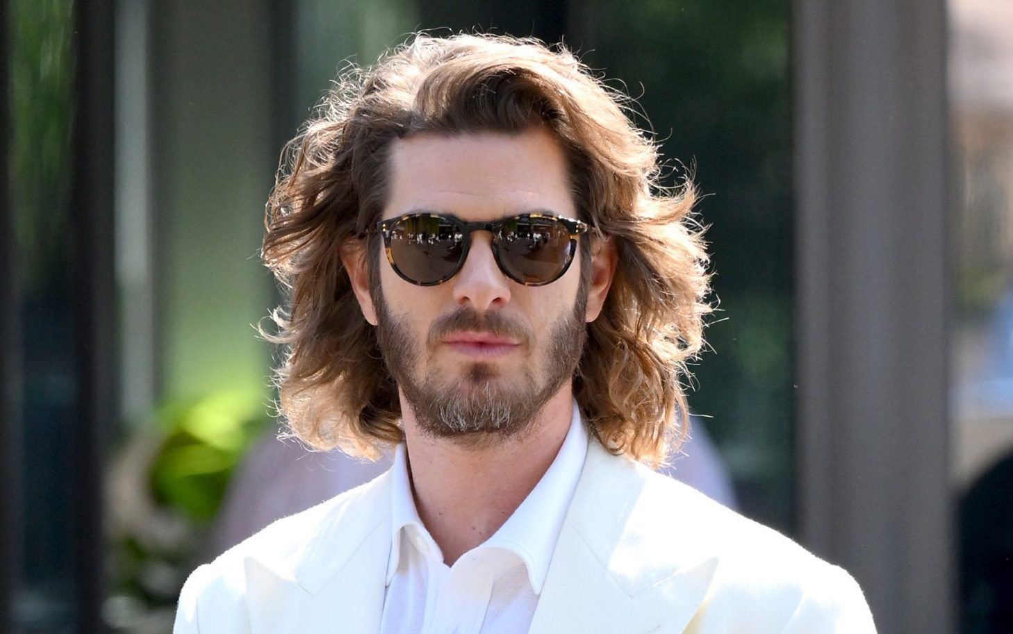 Andrew Garfield, wearing Ralph Lauren, attends day fourteen of the 2026 Wimbledon Tennis Championships at the All England Lawn Tennis and Croquet Club on July 12, 2026 in London, England