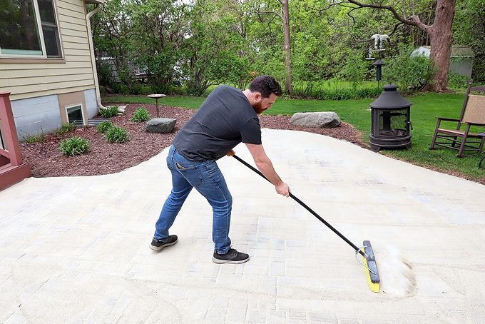 Man Restoring Patio Pavers