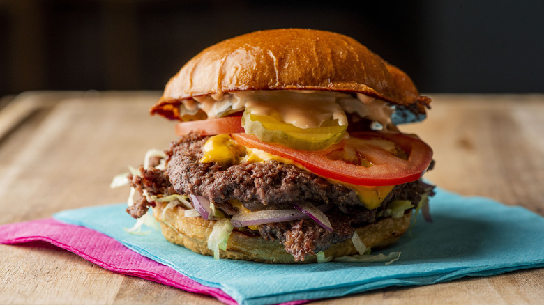 Fully loaded hamburger with cheese