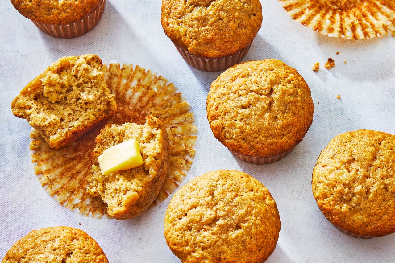 Southern Living Banana Muffins one broken open with some butter to serve