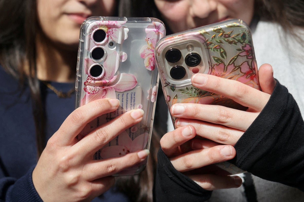 FILE PHOTO: Students from Wimbledon talk to Reuters about their thoughts on a social media ban for under 16s