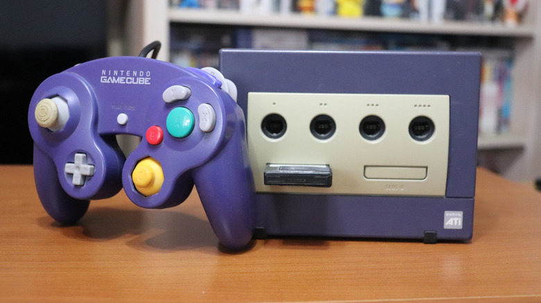 Nintendo GameCube with a memory card slotted into the system