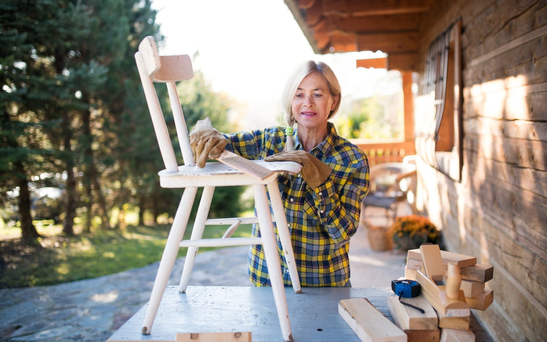 Old woman renovating