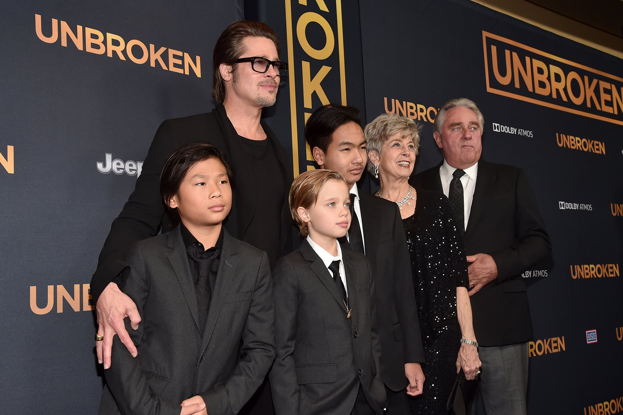 Pax Thien Jolie-Pitt, pictured here in 2014, far left, is the only child left to keep his father’s surname (Getty)
