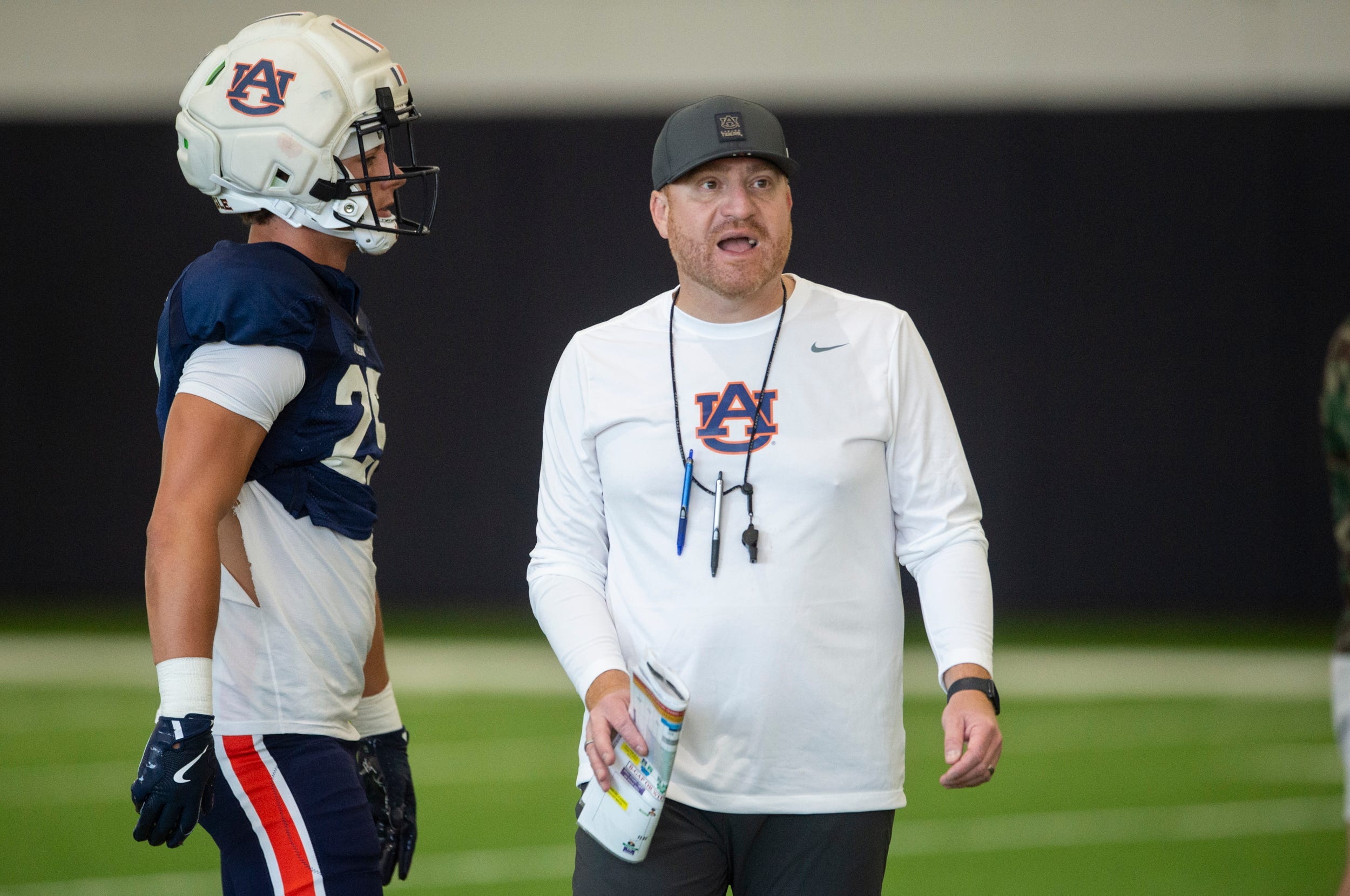 Auburn Tigers head coach Alex Golesh talks with his team during practice at Woltosz Football Performance Center in Auburn, Ala. on Thursday, April 16, 2026.