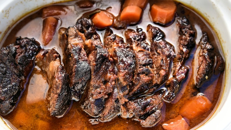 Braised beef brisket with carrots.