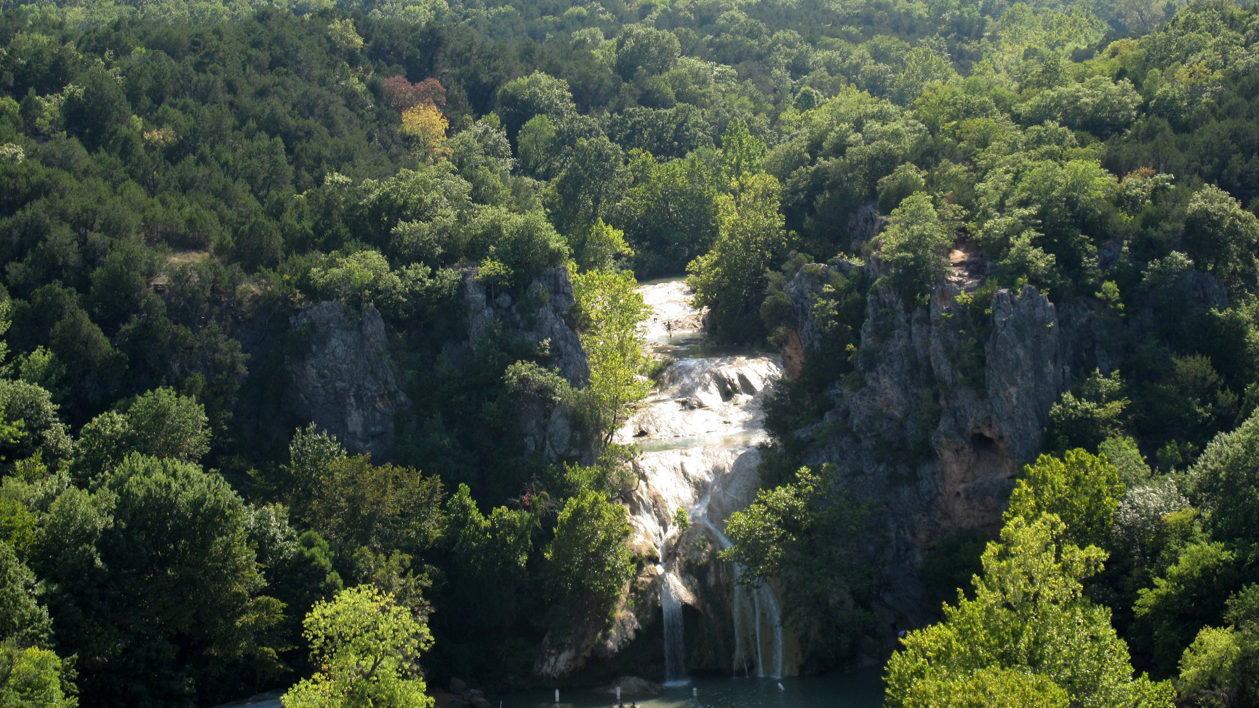 view of turner falls, an epic waterfall in the arbuckle mountains of oklahoma