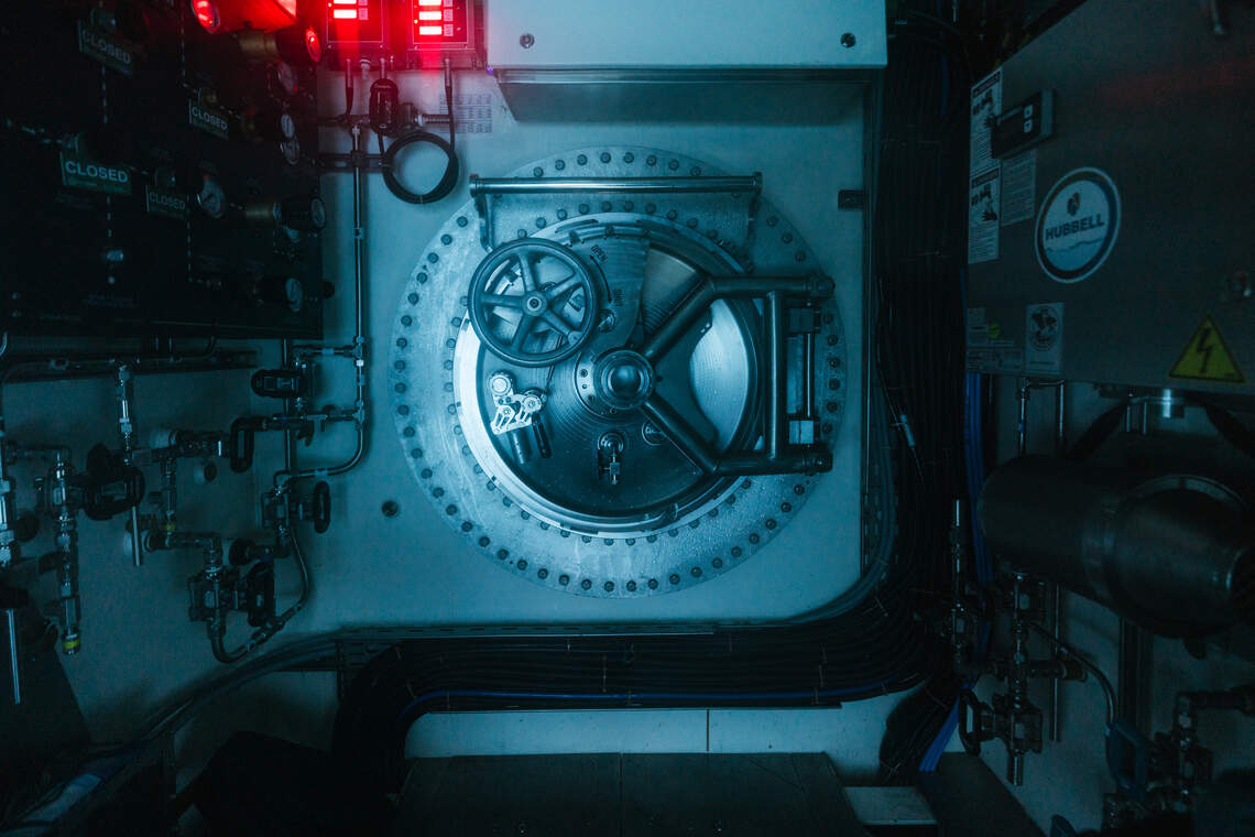 The hatch between the living chamber and dive center.