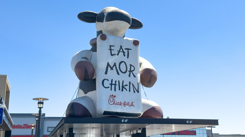 Chick-fil-A signage with the mascot cow