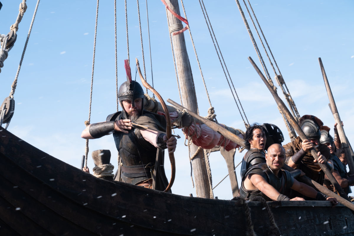 Matt Damon (frame left, with bow) is Odysseus