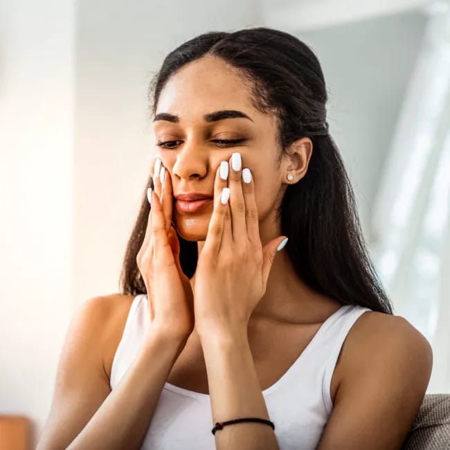 The Face-Lifting Exercises That Can Help Tighten Sagging Skin Naturally: Duck Lips Exercise, More