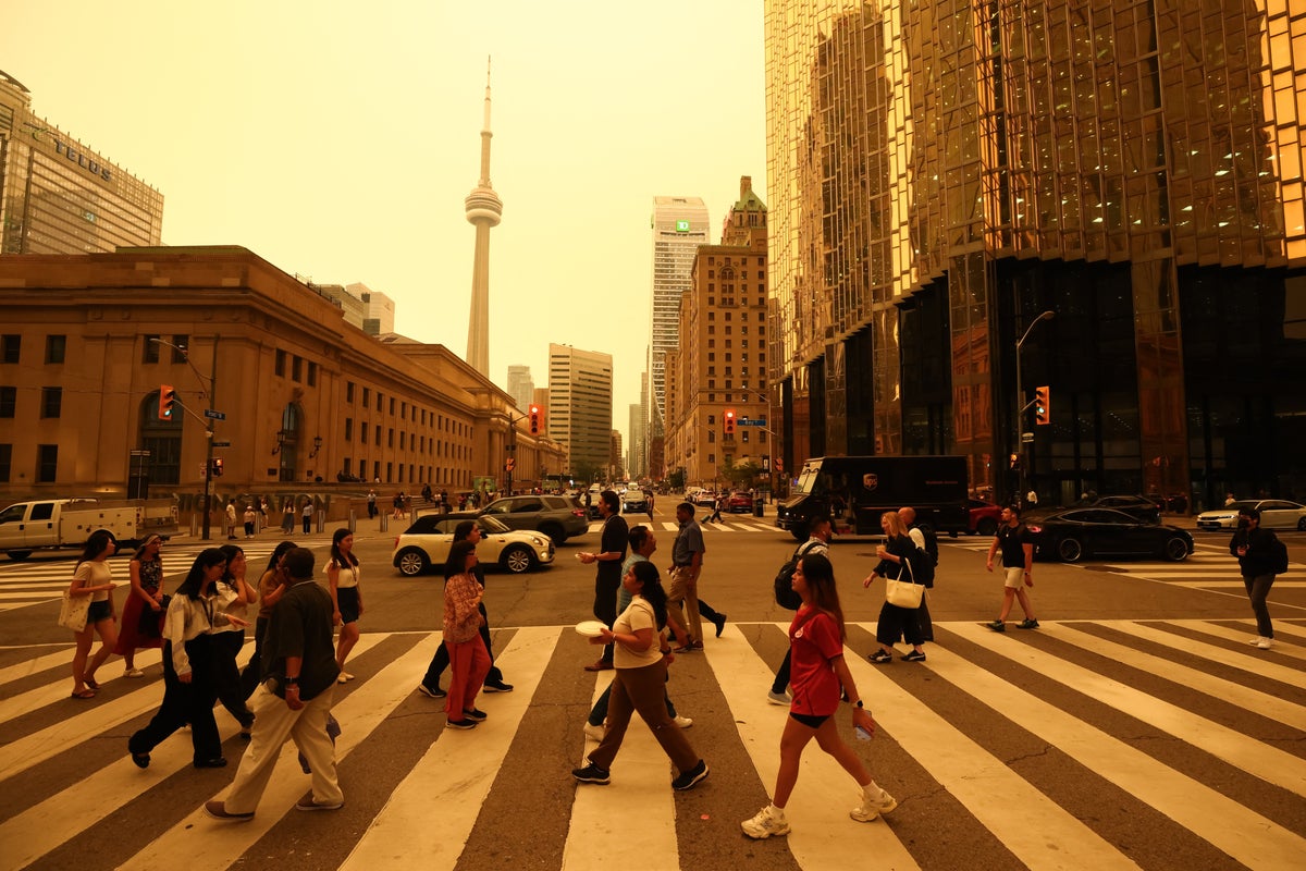 Toronto's skies turn yellow as over 100 wildfires burn in Canada