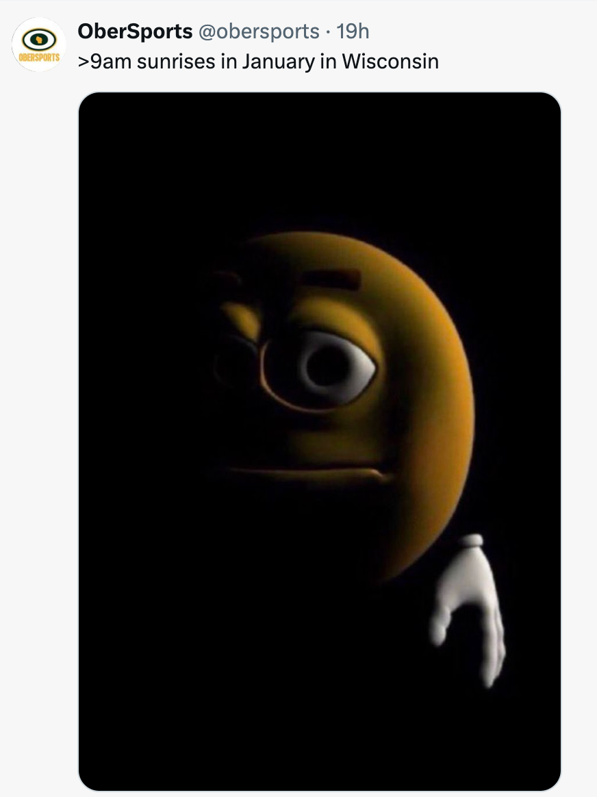 A partially visible brown cartoon character with a tired expression against a dark background, captioned about late sunrises in Wisconsin