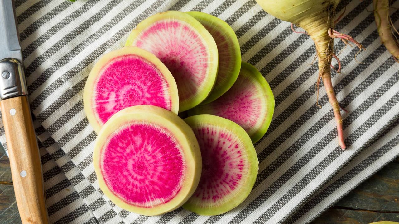 Slices of watermelon radish on towel
