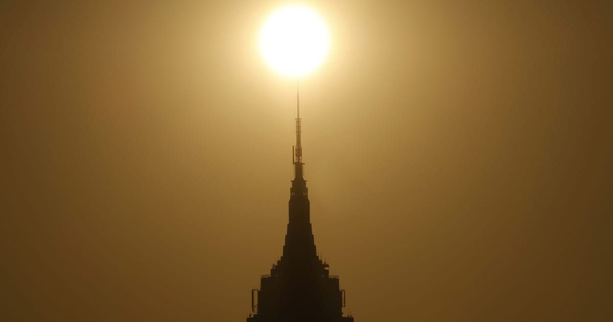 Boston's sky glows an eerie yellow as residents question smoky haze