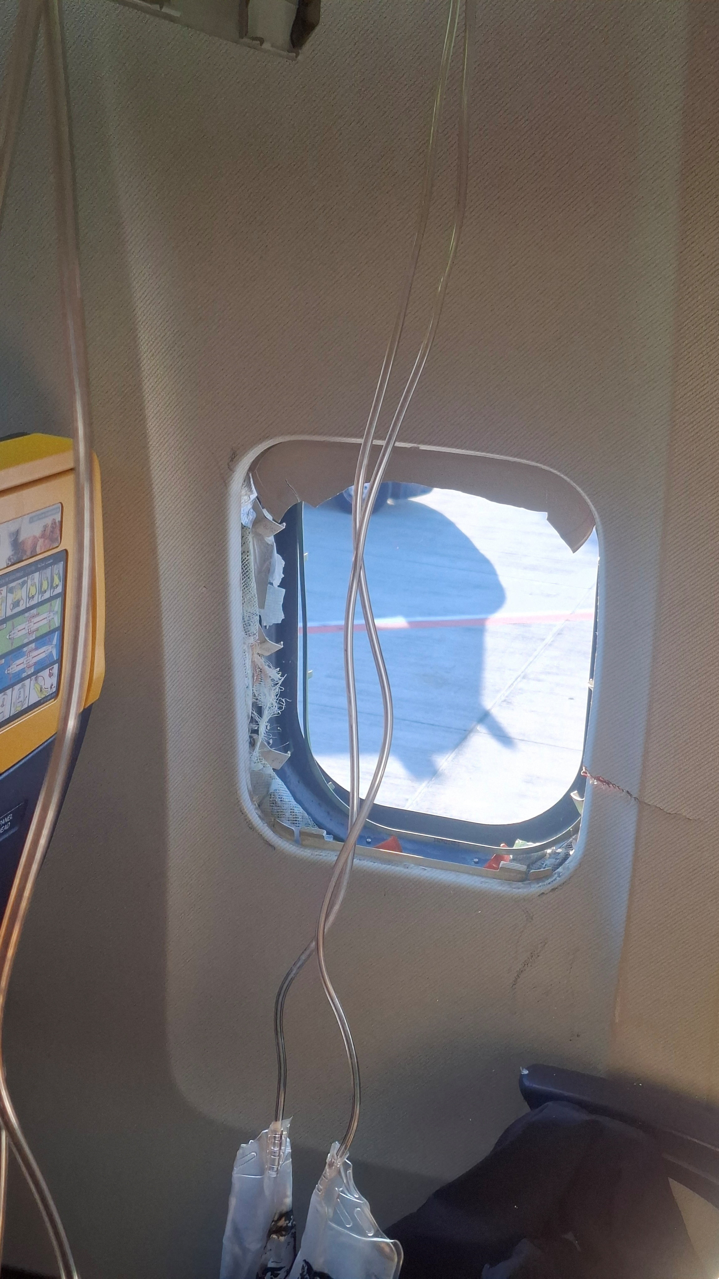 Wife describes moment husband was nearly sucked out of plane: 'His head and arm were hanging out'