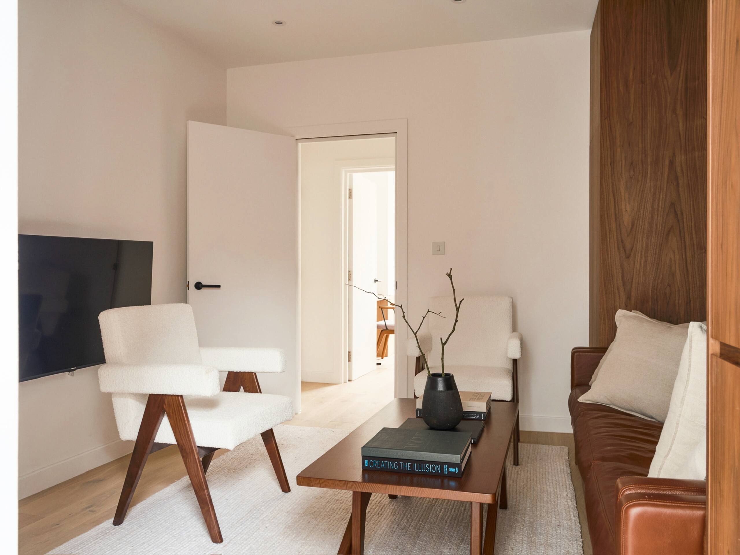 The living area with a couch and chairs