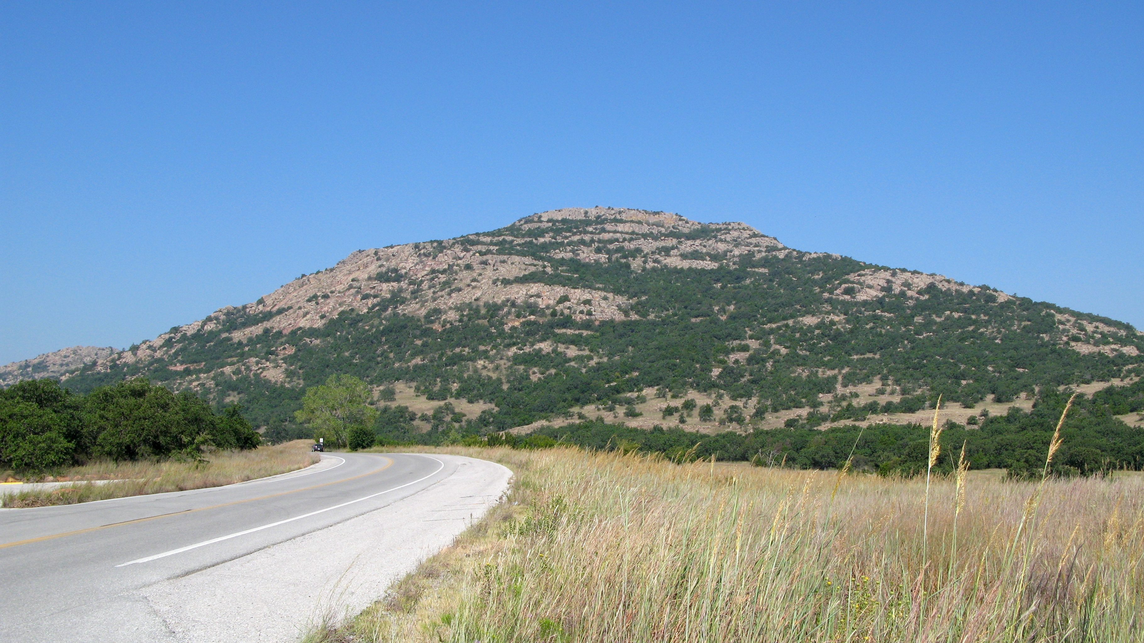 view of Mount Scott from a winding road in oklahoma