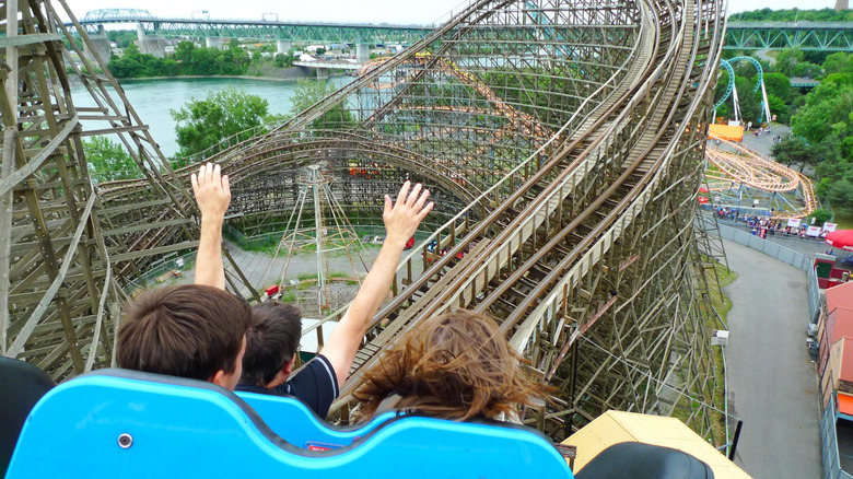 People riding the Le Monstre roller coaster in Montreal, Canada