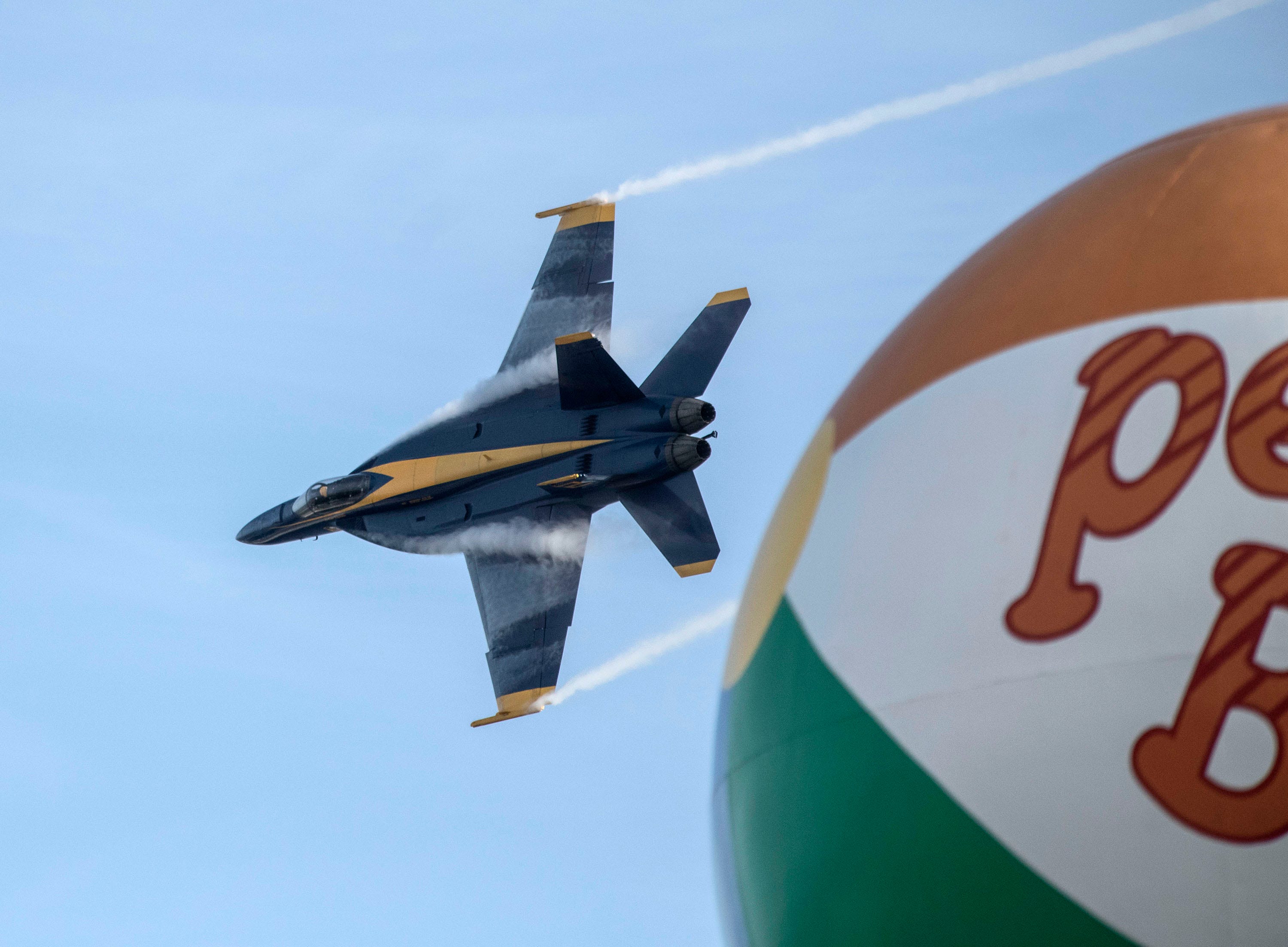 The U.S. Navy Blue Angels streak across the skies over Pensacola Beach during the annual Breakfast with the Blues event on July 15, 2026.
