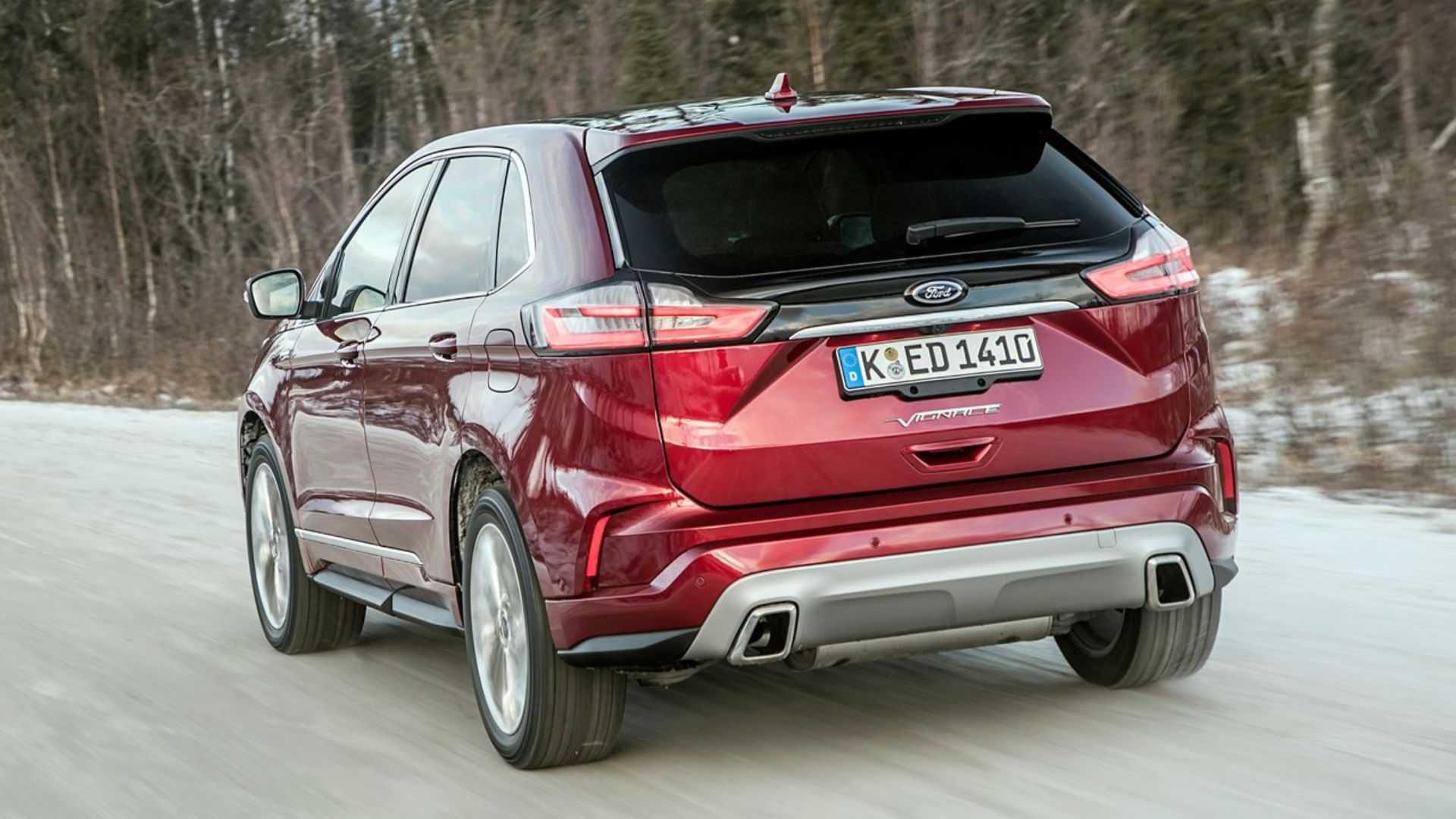 Dynamic rear 3/4 shot of a 2019 Ford Edge.