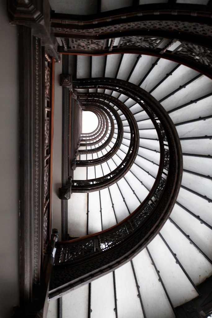 Look up the famed spiral staircase of the Rookery Building in Chicago, Illinois, the country's oldest surviving skyscraper, completed in 1888.