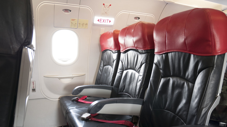 The Coldest Seats On A Plane, According To A Flight Attendant And Rick Steves