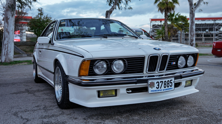 A white tuned BMW 6-Series from the 1980s