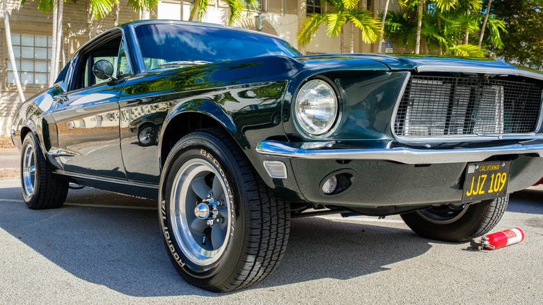A restored 1968 Ford Mustang Bullitt wearing Torq Thrust wheels.