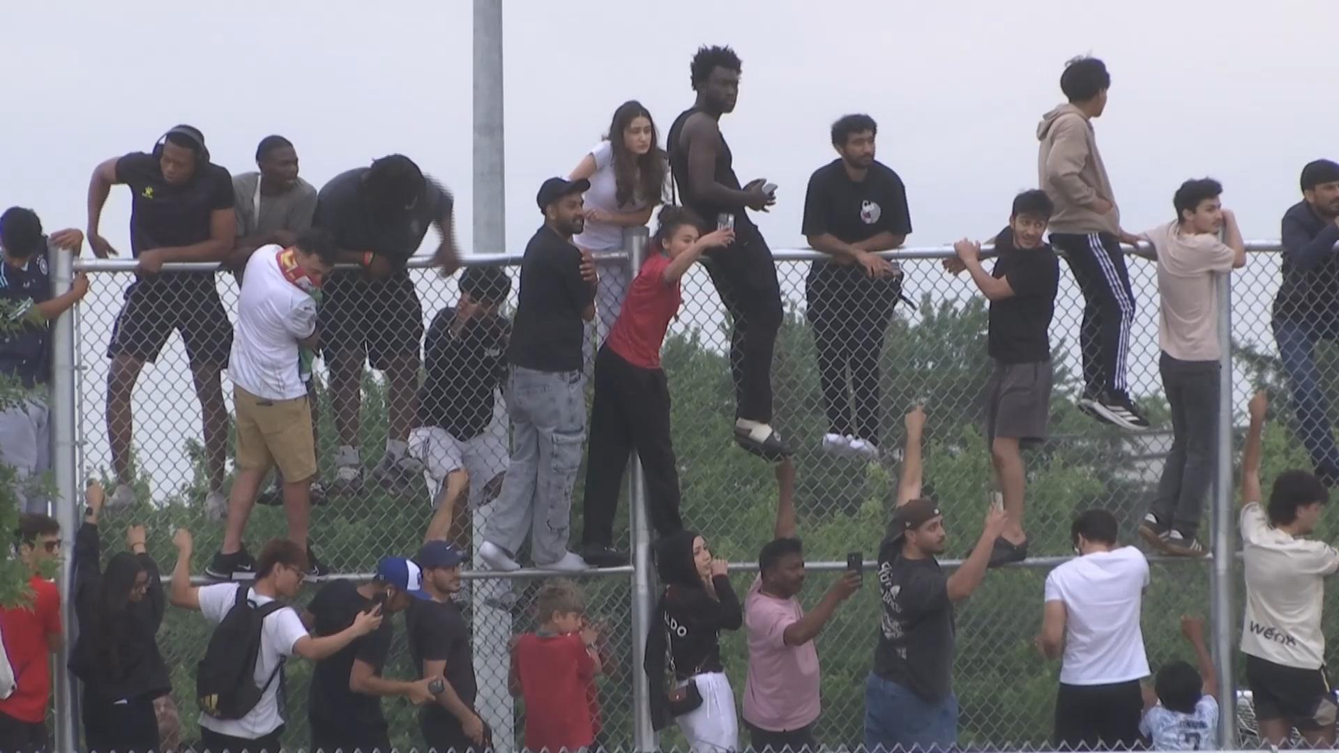 Ronaldo fever hits new heights as fans climb fences to watch Portugal