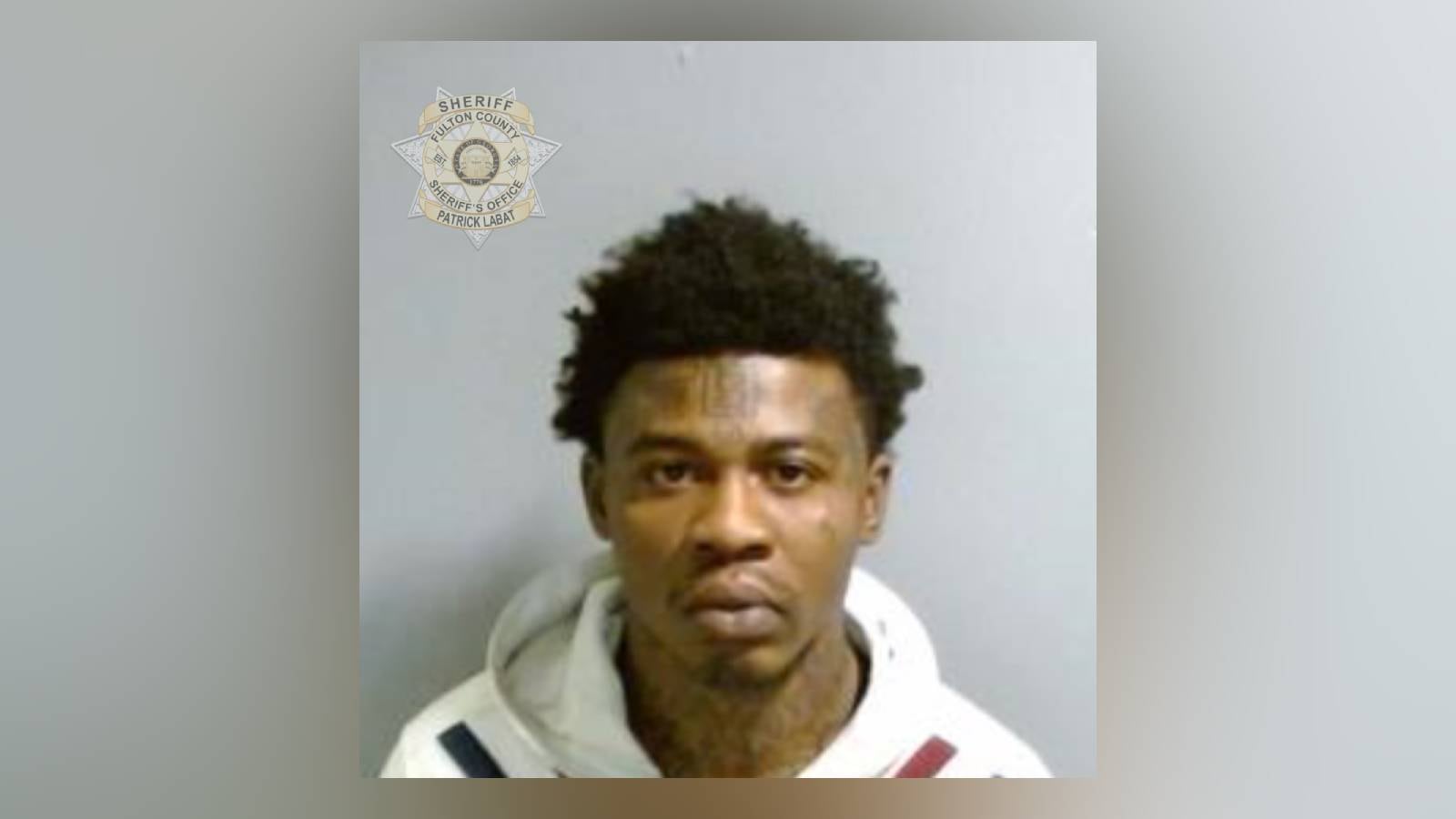 Convicted felon accused of firing gun during pawn shop robbery