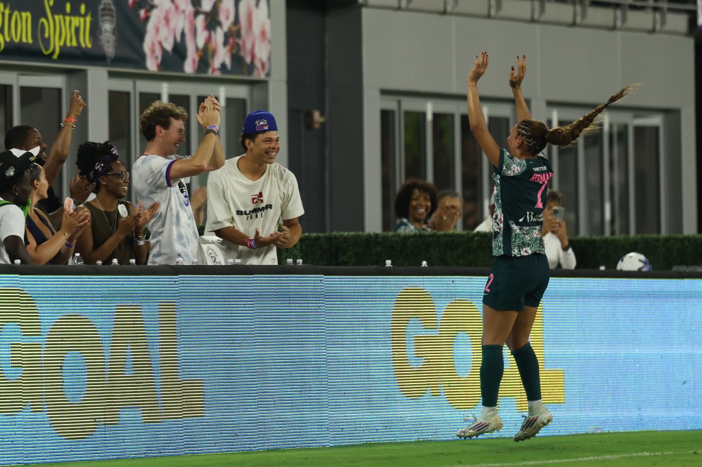 Trinity Rodman runs to Ben Shelton for 'bittersweet' kiss after scoring ...