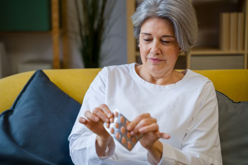 Woman taking pill