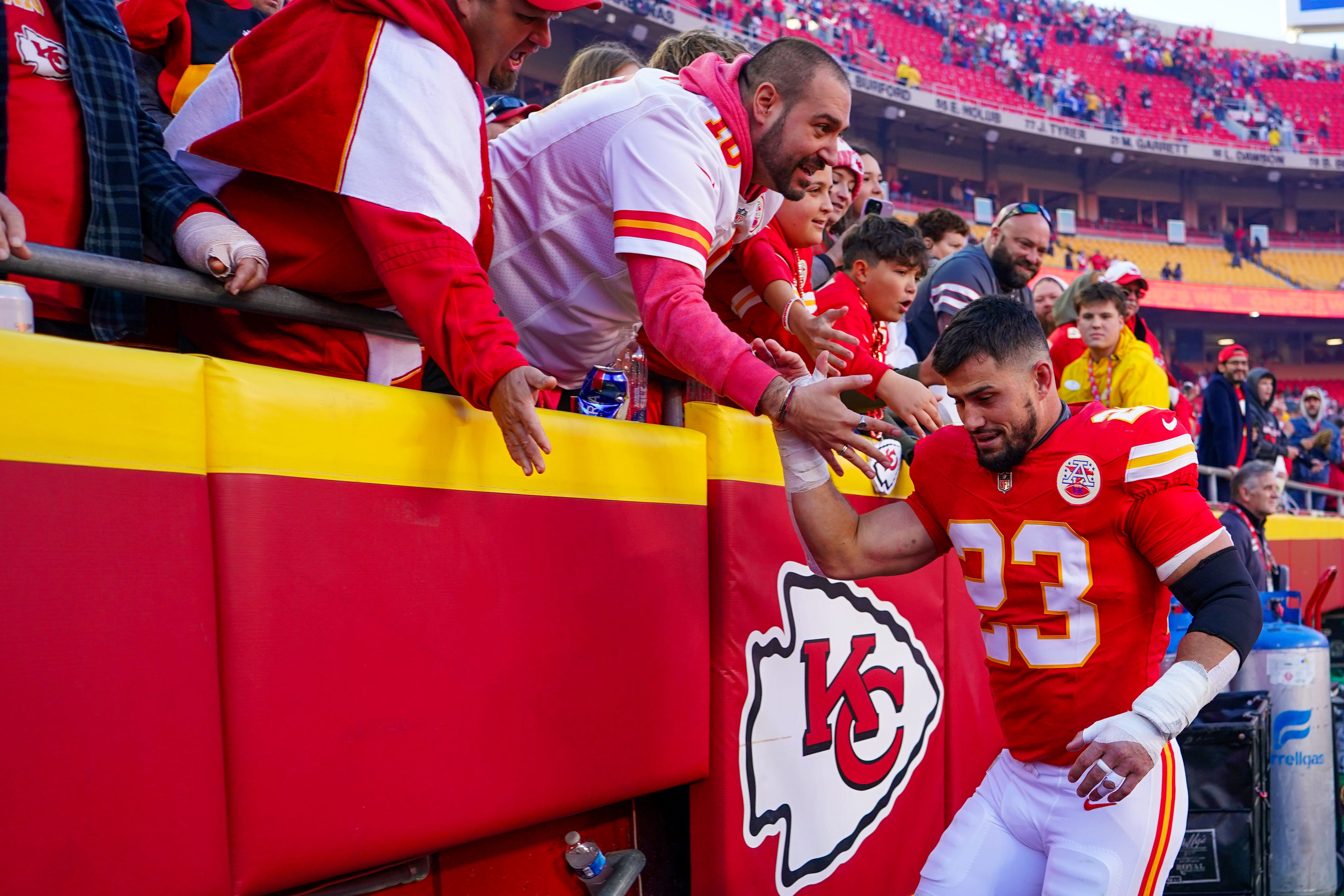 Nov 23, 2025; Kansas City, Missouri, USA; Kansas City Chiefs linebacker Drue Tranquill (23) greets fans while leaving the field after the game against the Indianapolis Colts at GEHA Field at Arrowhead Stadium. Mandatory Credit: Denny Medley-Imagn Images
