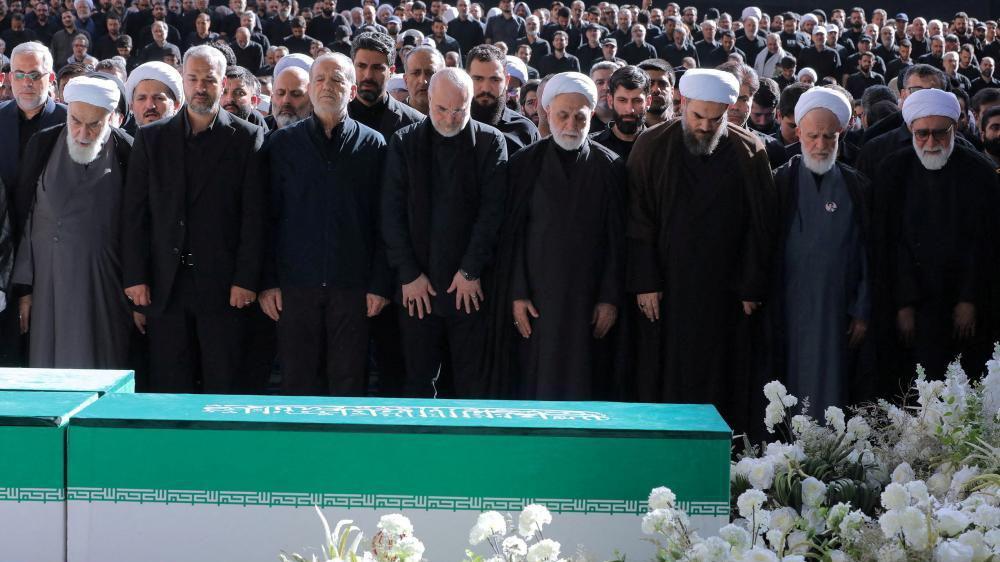 Iran's supreme leader absent as senior officials attend ayatollah's funeral