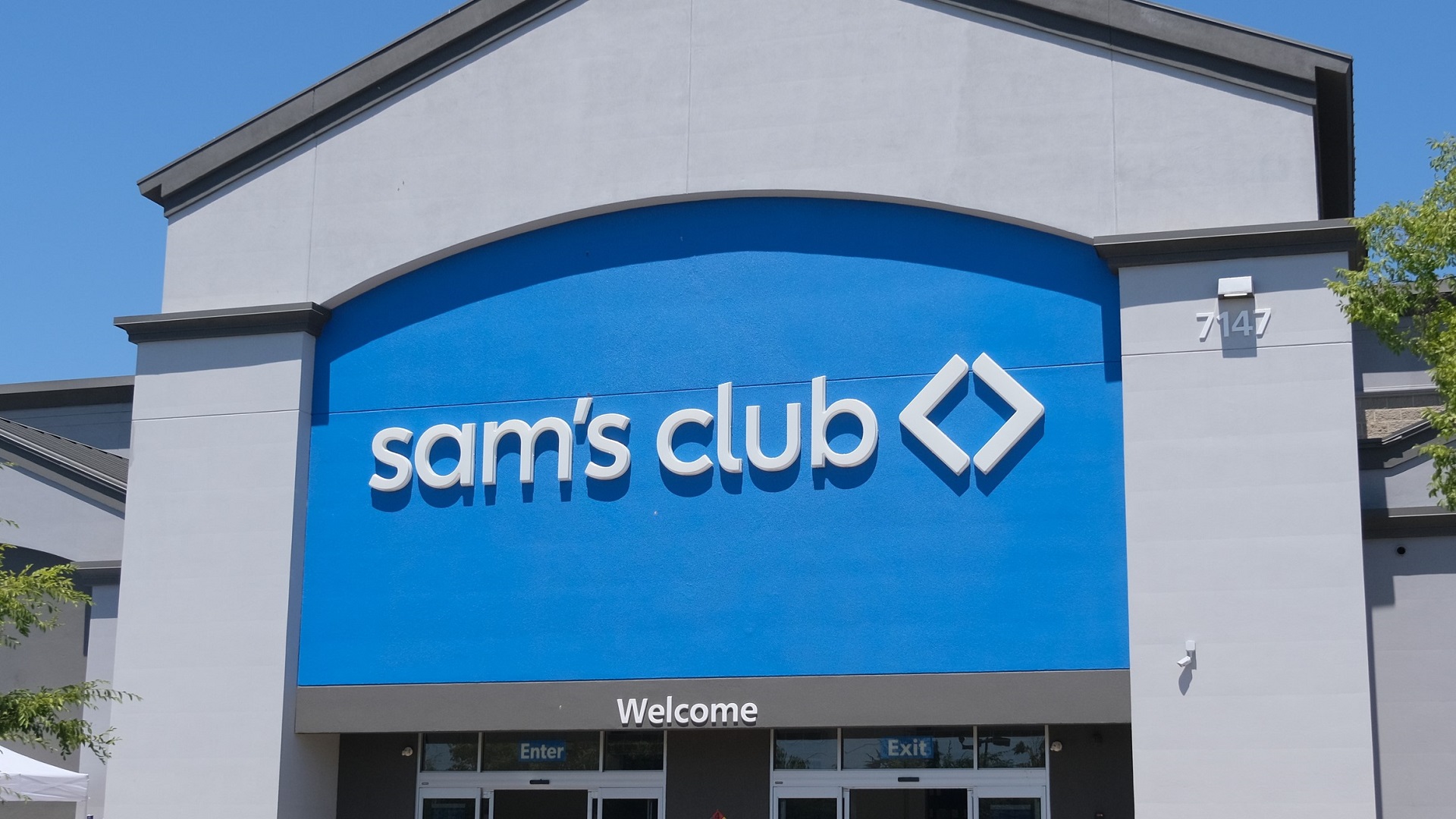 Discover a Sam’s Club storefront with its bold blue signage and wide entrance, capturing the exterior of the warehouse store