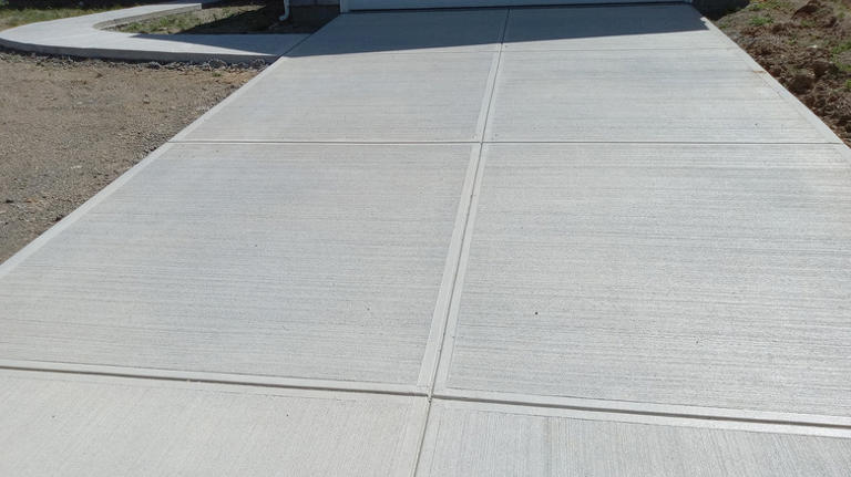Why do people cut lines in concrete driveways?