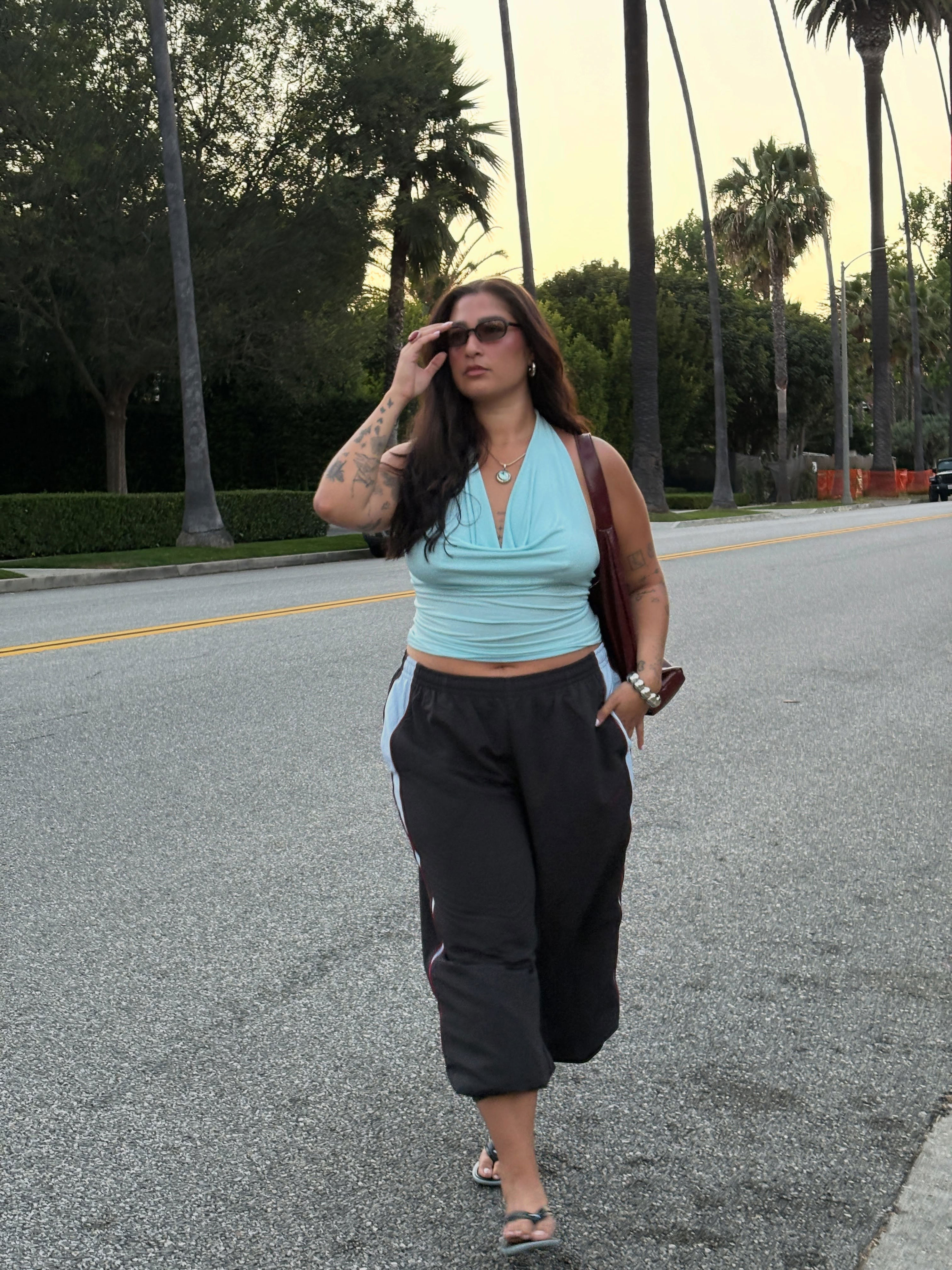 An image of a woman wearing best shoes to wear with capri sweats