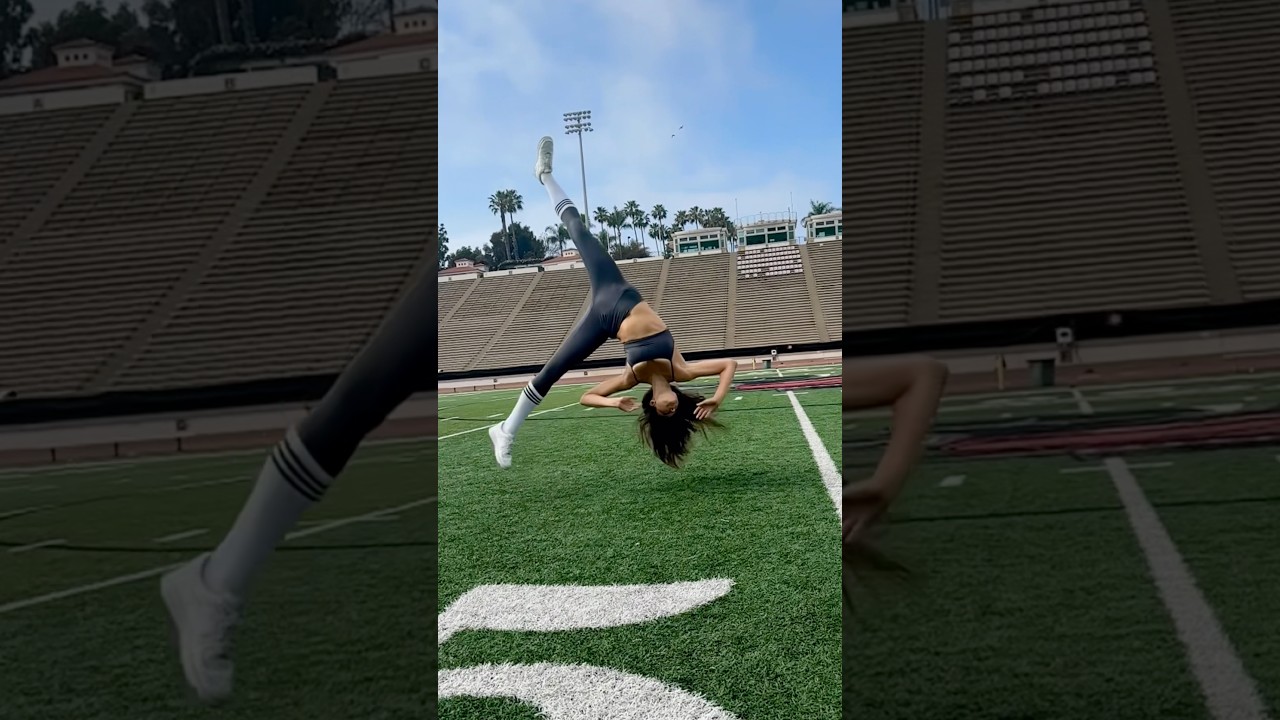 Athletic model performs an impressive flip on the football field