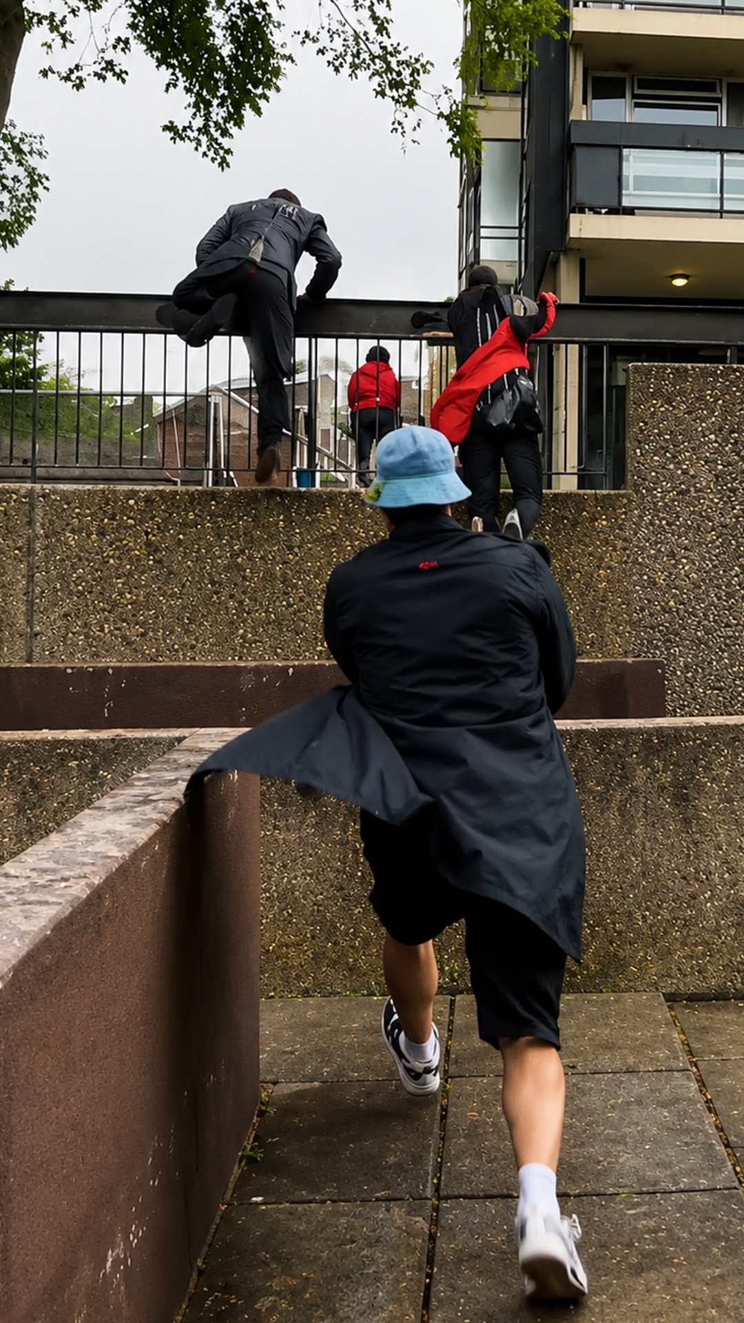 Behind the scenes of a parkour action sequence