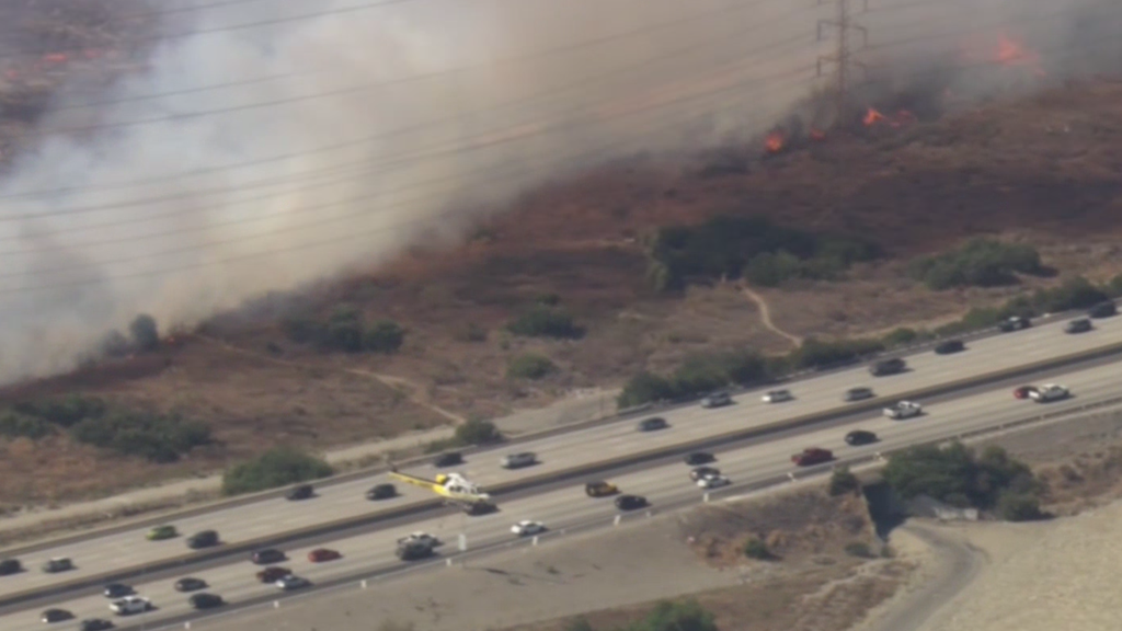 LA County firefighters battle Arrow Fire burning near 605 Freeway in ...