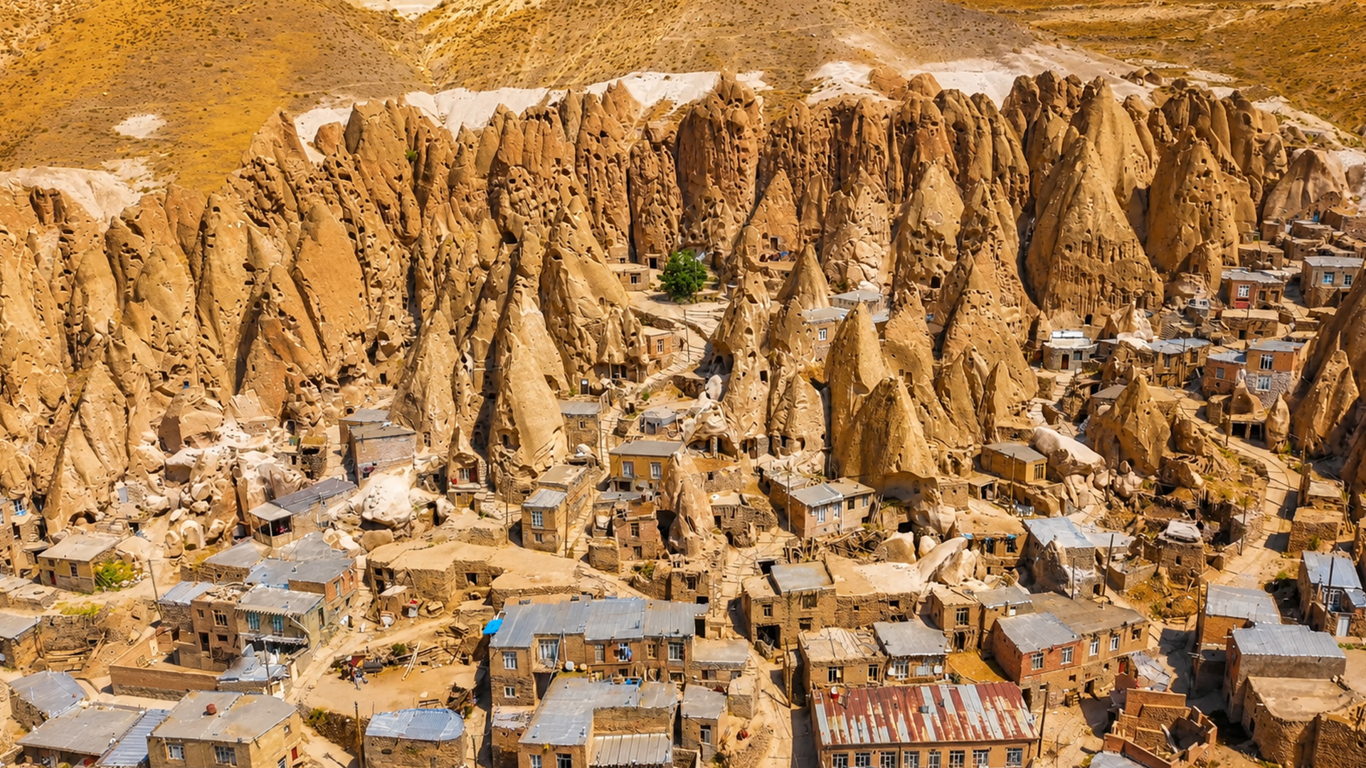 A village hidden inside stone towers